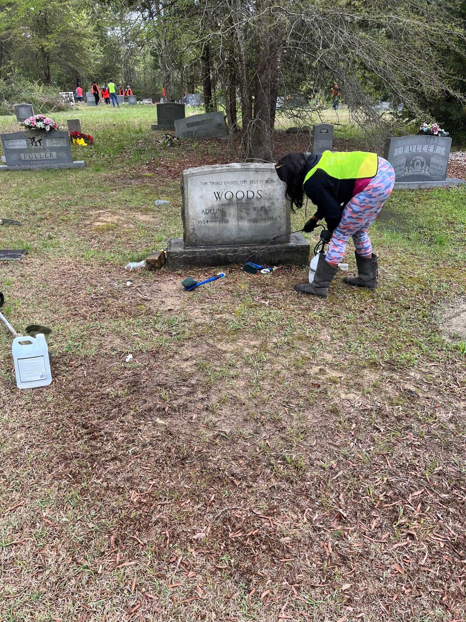 Cleaning a headstone during cleanup