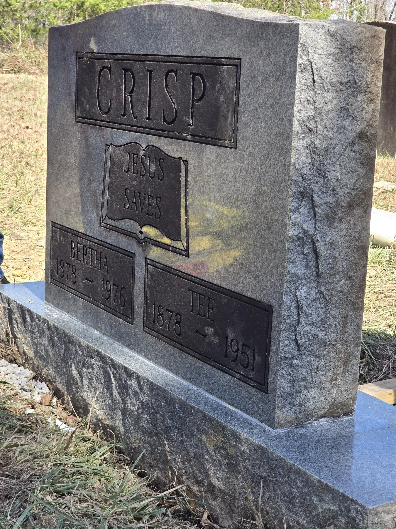 Close-up of a reset historic headstone after restoration work at Snow Hill Cemetery